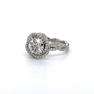 Floral-Inspired Diamond Engagement Ring With Twisted Band Engagement Rings