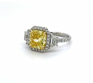 Fancy Yellow Radiant-Cut Engagement Ring With Trapezoids Engagement Rings