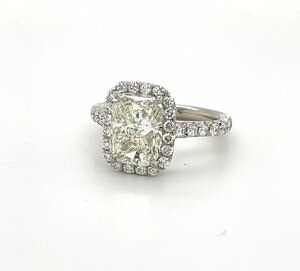 Radiant-Cut Engagement Ring with a Diamond Halo Engagement Rings