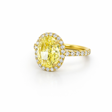 Oval-Shaped Yellow Diamond Ring with a Halo Custom Engagement Rings