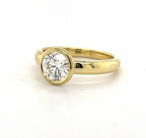 Yellow Gold Ring with a Bezel-Set Round Diamond Engagement Rings