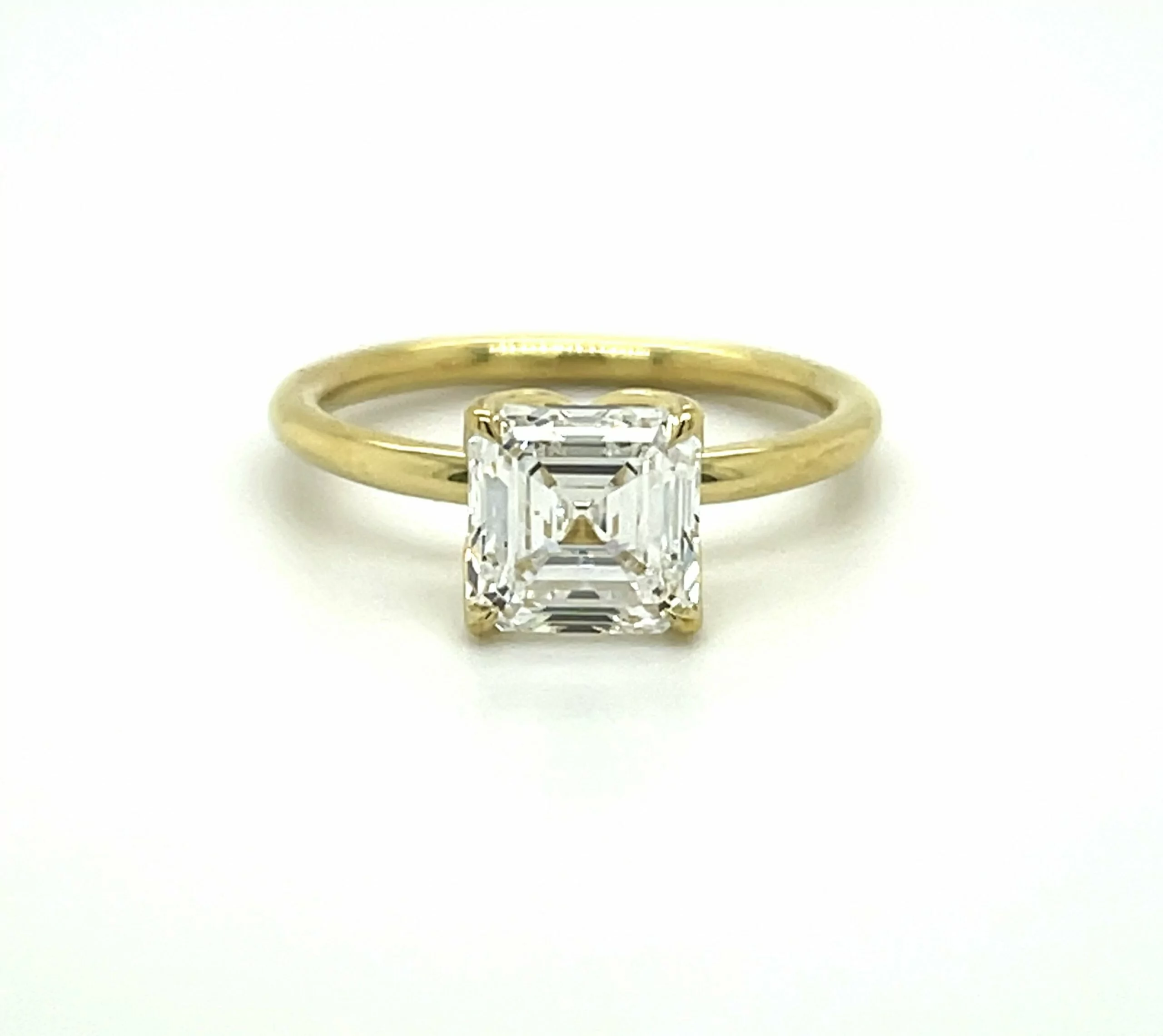 Asscher Cut Diamond Ring in a Yellow Gold Setting