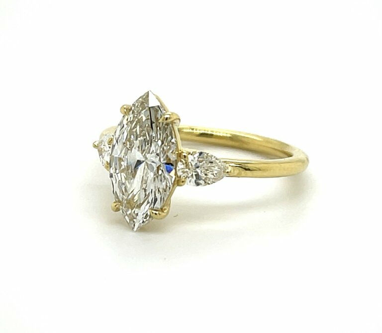 Marquise and Pear Three Stone Ring in 18ct White Gold