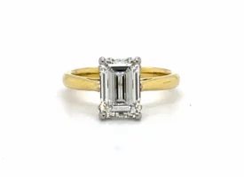 Two Tone Emerald Cut Ring With A Scalloped Gallery
