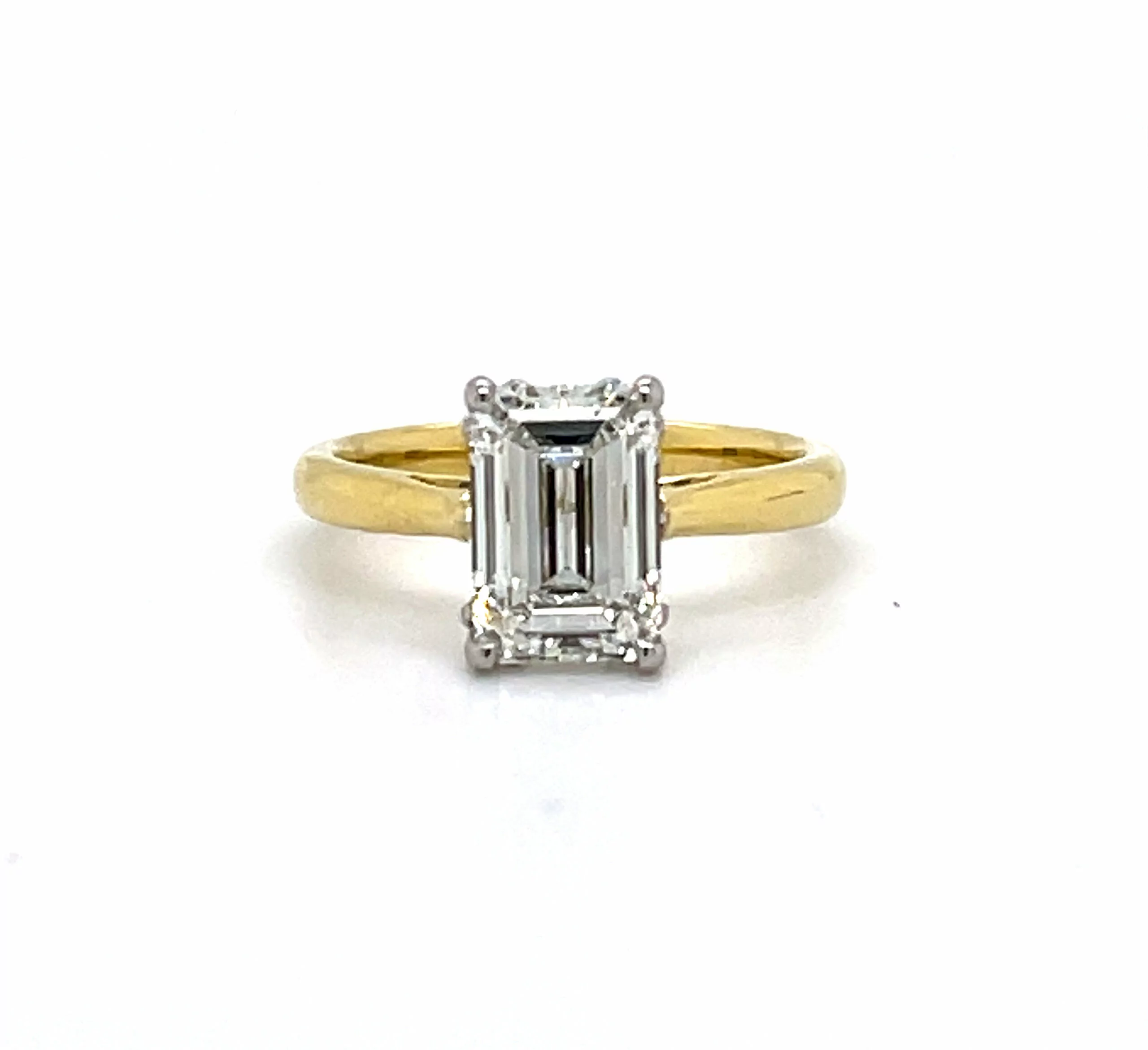 Two Tone Emerald Cut Ring With A Scalloped Gallery