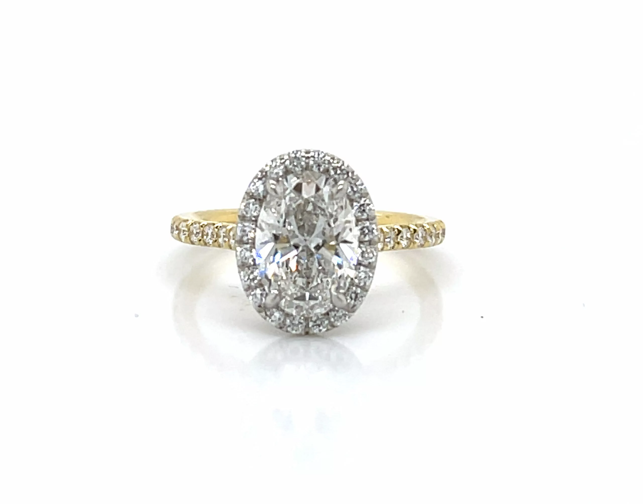 Two Tone Oval Engagement Ring with Halo