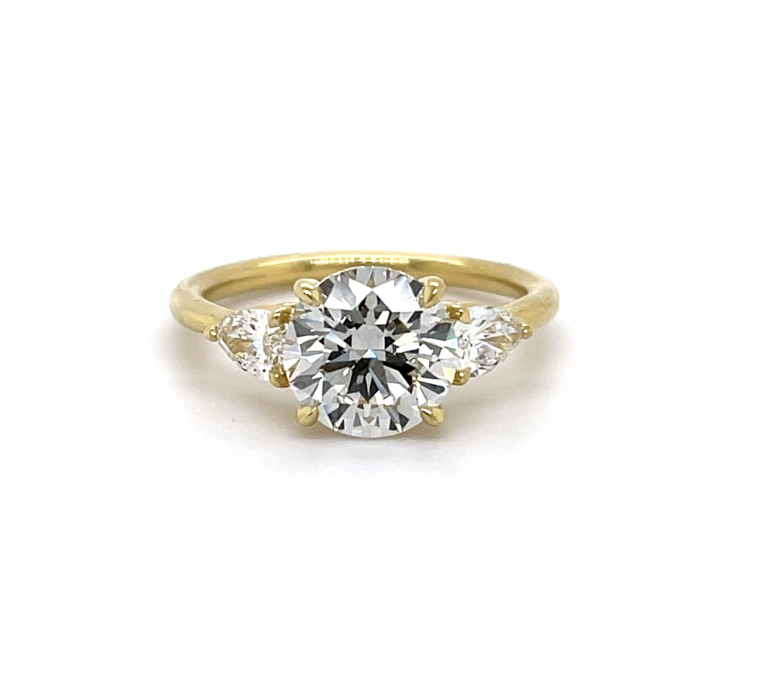 Three-Stone Round and Pear Diamond Ring Engagement Rings 2