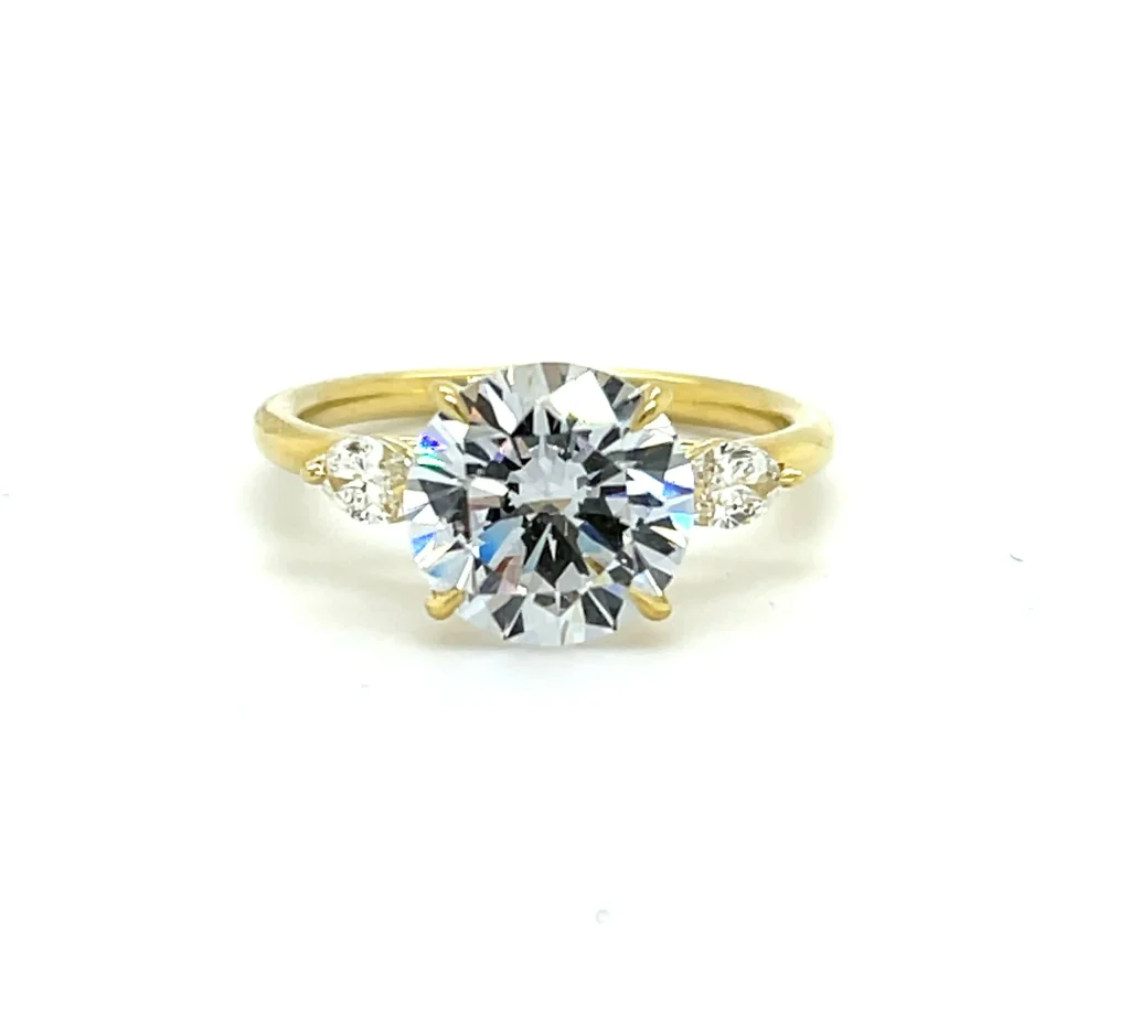Three Stone Round and Marquise Diamond Engagement Ring in Yellow Gold