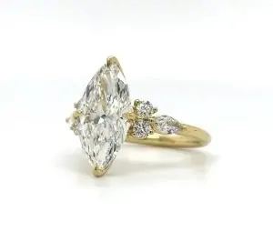 Yellow Gold Marquise Engagement Ring with Marquise and Round Side Stones Engagement Rings