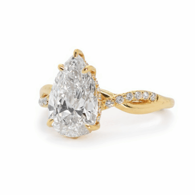 Pear-Shaped Engagement Ring with a Twisted Band Custom Engagement Rings