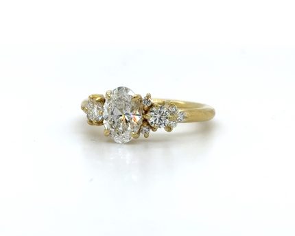 Oval Ring with Scattered Side Diamonds Custom Engagement Rings