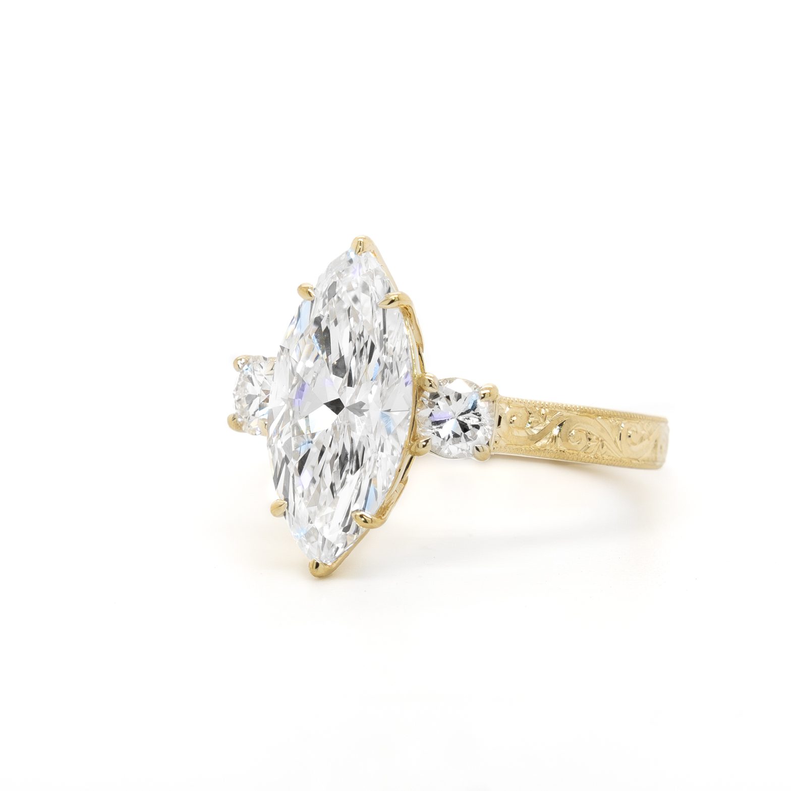 Marquise Diamond Ring with Round Side Stones and Engraved Band Los Angeles