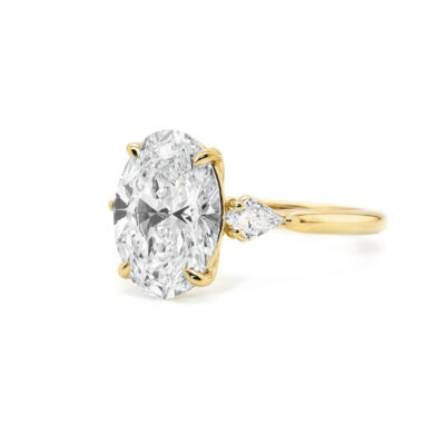 Oval Diamond Ring with Kites and Floral Prongs Custom Jewelry