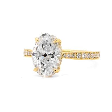 Oval-Cut Diamond Engagement Ring with Hidden Halo and Floral Prongs Custom Engagement Rings