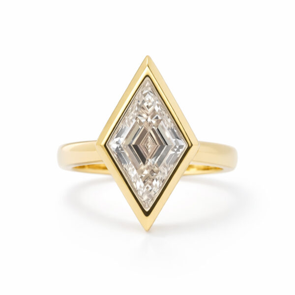 Lozenge-Cut Diamond Ring in a Bold Yellow Gold Bezel Unique Rings 3