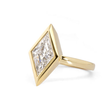 Lozenge-Cut Diamond Ring in a Bold Yellow Gold Bezel Unique Rings
