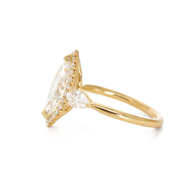 Marquise-Cut Diamond with Halo and Pear Side Stones Custom Engagement Rings 4