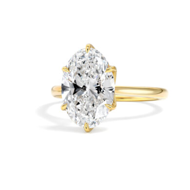 Oval Cut Diamond Ring with Floral Prongs and Engraved Bridge Custom Engagement Rings