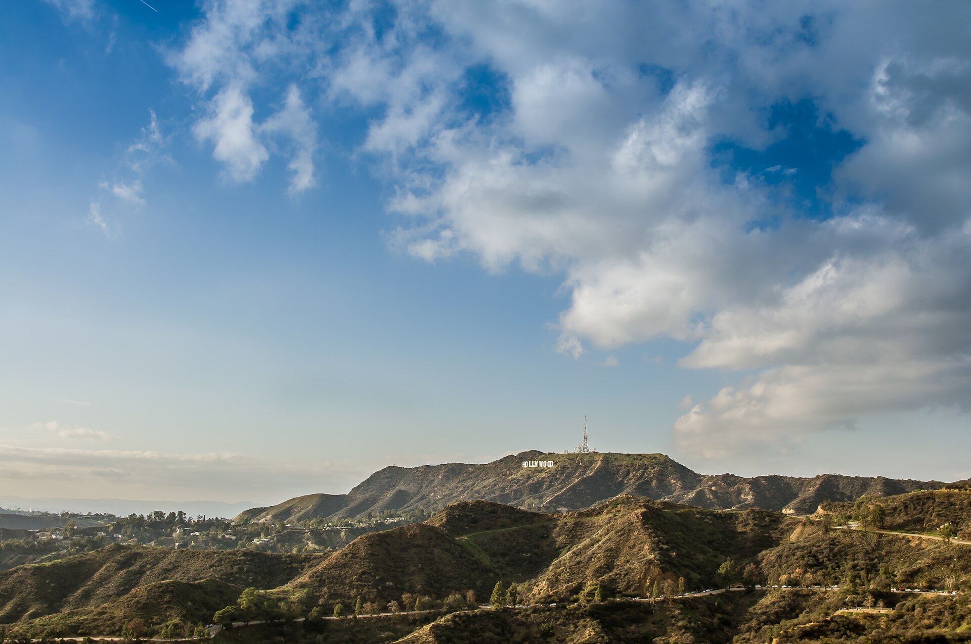 The Hollywood Sign above the hills near Lake Hollywood Park