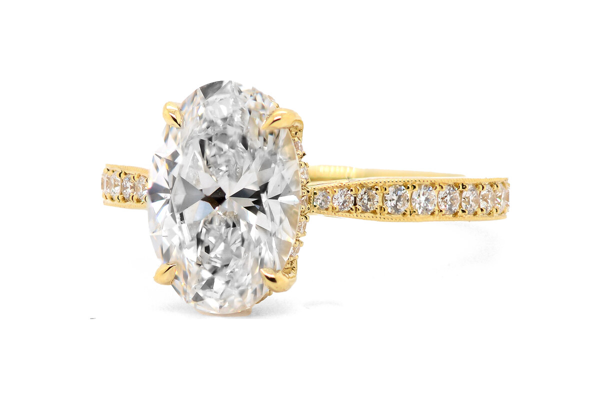 Peter Norman Oval-Cut Diamond Engagement Ring with Hidden Halo and Floral Prongs
