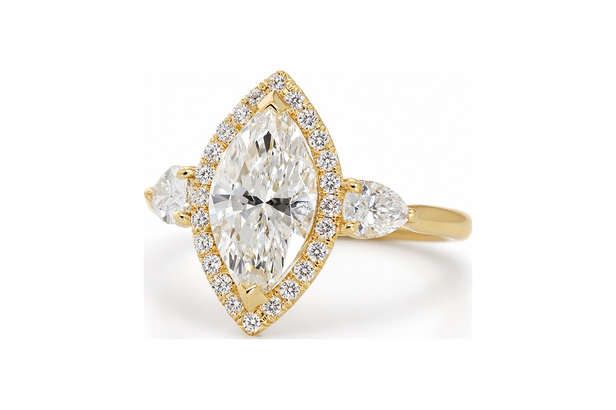 Peter Norman Marquise-Cut Diamond with Halo and Pear Side Stones