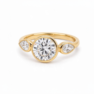 Round Brilliant Bezel Ring with Pear Diamond Side Stones in 18k Yellow Gold Custom Engagement Rings
