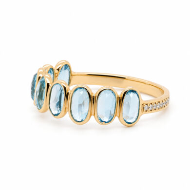 Oval Rose-Cut Blue Topaz Seven-Stone Ring in 14k Yellow Gold with Pavé Diamond Shank Eternity Bands