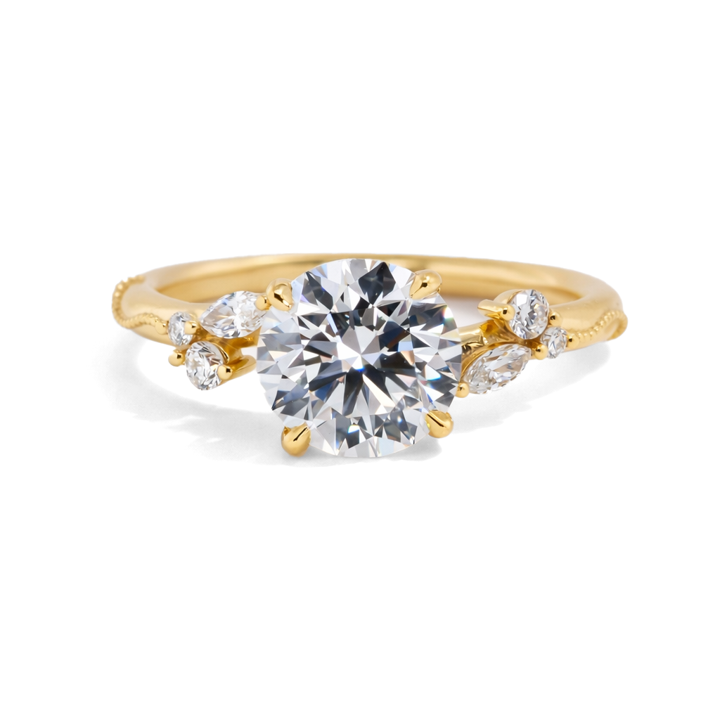 A Peter Norman Jewelers custom engagement ring with a round center diamond and delicate marquise and round side stones