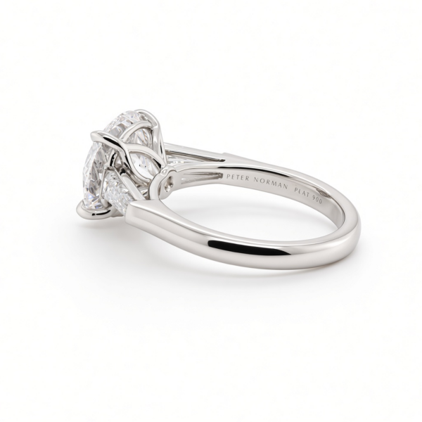 Round Brilliant Diamond Ring in Platinum with Tapered Baguettes and Floral Prongs Custom Engagement Rings 4