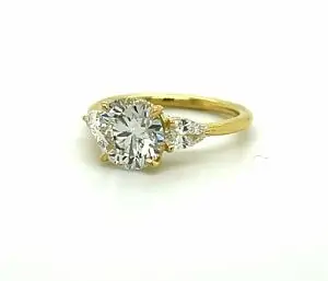 Three-Stone Round and Pear Diamond Ring Custom Engagement Rings